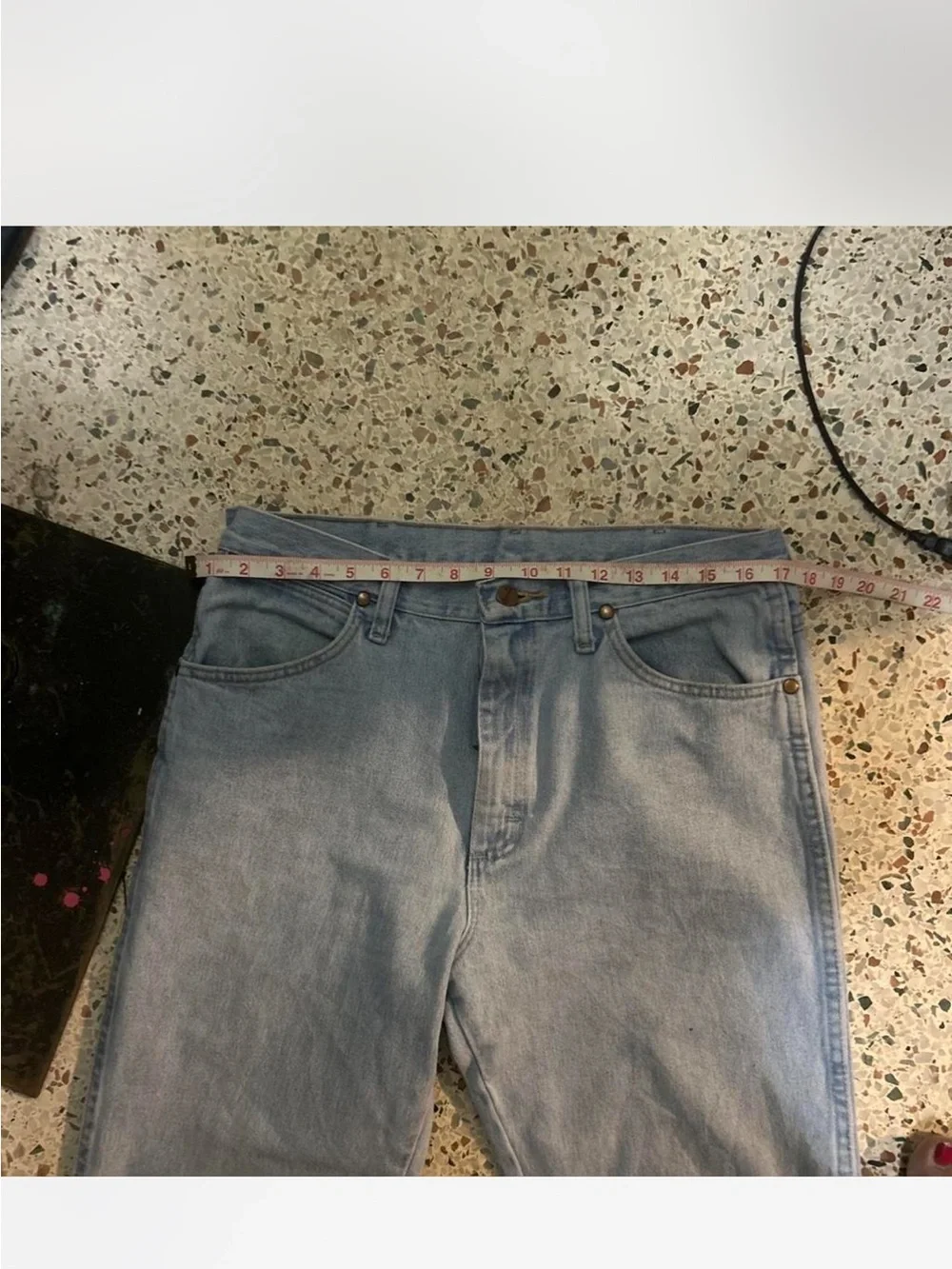 Wrangler denim visible